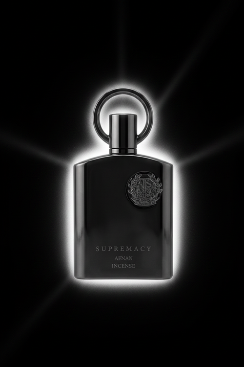 Afnan Supremacy Incense perfume bottle with dramatic silver glow